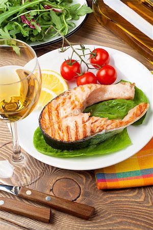 salmon steak on bbq - Grilled salmon and whtie wine on wooden table Stock Photo - Budget Royalty-Free & Subscription, Code: 400-08074773