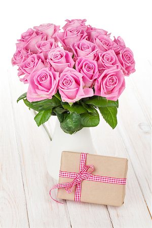 simsearch:400-08110734,k - Valentines day pink roses bouquet and gift box on white wooden table Stock Photo - Budget Royalty-Free & Subscription, Code: 400-08074812