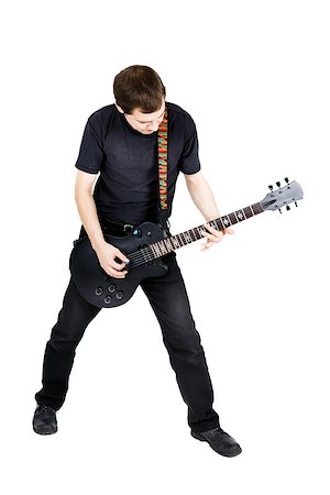 simsearch:400-08138723,k - young man with an electric guitar. Isolated on white background Stock Photo - Budget Royalty-Free & Subscription, Code: 400-08075212
