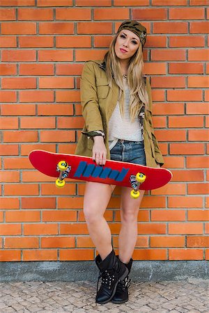 swag - Beautiful and sexy street girl with her skateboard Stock Photo - Budget Royalty-Free & Subscription, Code: 400-08075274