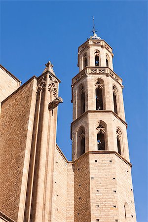 photojope (artist) - Stone facade with a gargoyle and tower of the medieval gothic cathedral of Saint Mary of the Sea in Barcelona, Catalonia, Spain. Photographie de stock - Aubaine LD & Abonnement, Code: 400-08075409