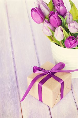 simsearch:400-08036453,k - Purple tulip bouquet and gift boxes on wooden table. Toned Stock Photo - Budget Royalty-Free & Subscription, Code: 400-08075664