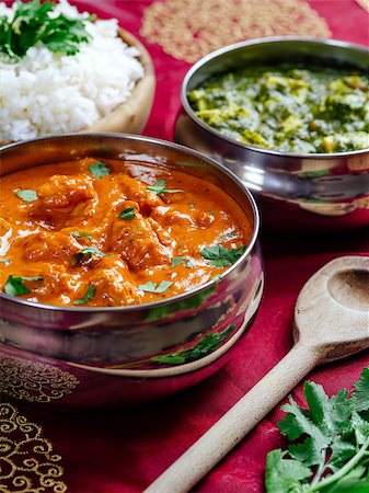 simsearch:400-04105894,k - Photo of an Indian meal of Butter Chicken, rice and Saag Paneer Foto de stock - Royalty-Free Super Valor e Assinatura, Número: 400-08075731