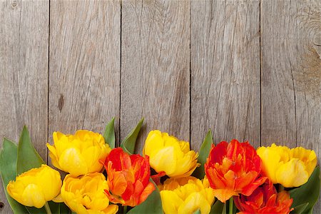 simsearch:400-08036453,k - Colorful tulips bouquet over wooden table background with copy space Stock Photo - Budget Royalty-Free & Subscription, Code: 400-08076145