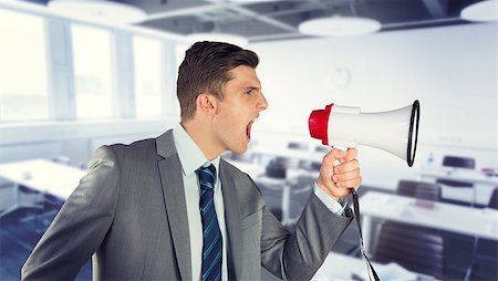Businessman shouting in loudspeaker against classroom Stock Photo - Budget Royalty-Free & Subscription, Code: 400-08076658