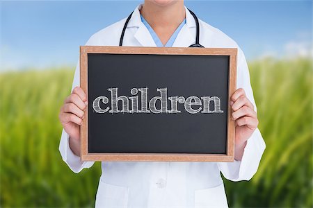 simsearch:400-08076735,k - The word children and doctor showing little blackboard against green meadow Foto de stock - Super Valor sin royalties y Suscripción, Código: 400-08076704