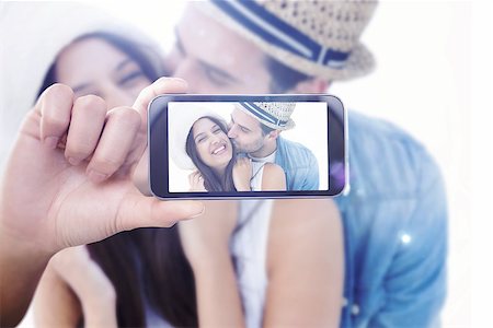 simsearch:400-07664794,k - Composite image of hand holding smartphone showing Stock Photo - Budget Royalty-Free & Subscription, Code: 400-08076856