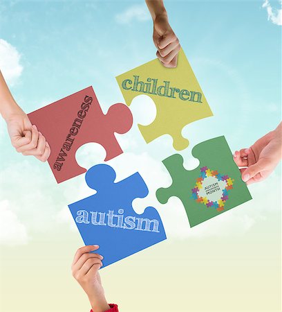 Autism awareness month against blue sky Stockbilder - Microstock & Abonnement, Bildnummer: 400-08076915