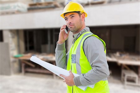 Architect on the phone against workshop Stock Photo - Budget Royalty-Free & Subscription, Code: 400-08077010