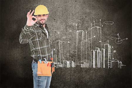 service construction - Smiling handyman gesturing okay against hand drawn city plan Stock Photo - Budget Royalty-Free & Subscription, Code: 400-08077303