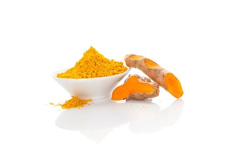 Turmeric, ayurvedic tradtional medicine. Dry ground turmeric and fresh root isolated on white background. Stockbilder - Microstock & Abonnement, Bildnummer: 400-08077733