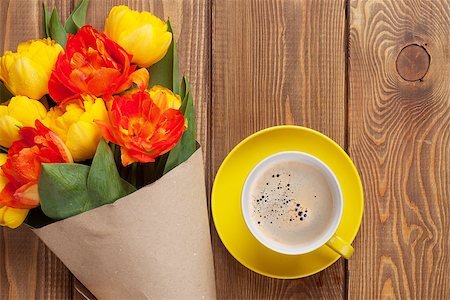 simsearch:400-08036453,k - Colorful tulips bouquet and coffee cup on wooden table. Top view with copy space Stock Photo - Budget Royalty-Free & Subscription, Code: 400-08078025