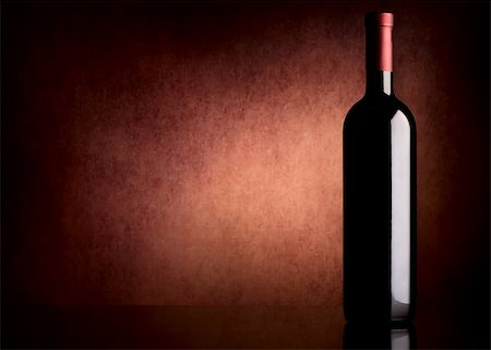 simsearch:400-06796159,k - Bottle with wine on a vinous background Stock Photo - Budget Royalty-Free & Subscription, Code: 400-08078071