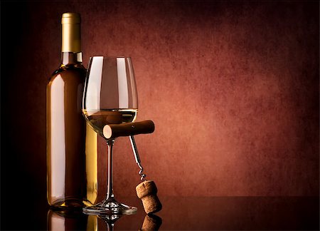 simsearch:400-05286682,k - White wine and corkscrew on a vinous background Stock Photo - Budget Royalty-Free & Subscription, Code: 400-08078207