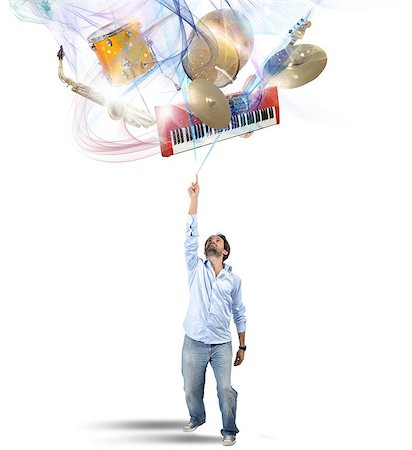 Musician chooses his instrument in colors vortex Stock Photo - Budget Royalty-Free & Subscription, Code: 400-08070530