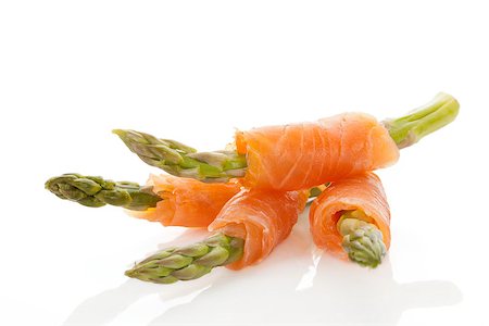 simsearch:400-08070549,k - Culinary seafood background. Asparagus wrapped in raw salmon. Stockbilder - Microstock & Abonnement, Bildnummer: 400-08070551