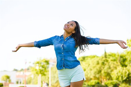 Outdoor portrait of a beautiful African American woman in the park Stock Photo - Budget Royalty-Free & Subscription, Code: 400-08070676