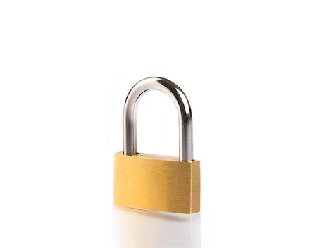 metal padlock on white background with reflection on white table Photographie de stock - Aubaine LD & Abonnement, Code: 400-08071065