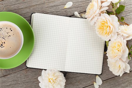Blank notepad, coffee cup and white rose flowers on wooden table background Stock Photo - Budget Royalty-Free & Subscription, Code: 400-08071448