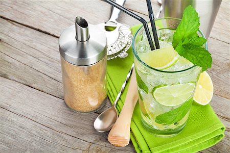 simsearch:400-07715048,k - Fresh mojito cocktail and bar utensils on wooden table Stock Photo - Budget Royalty-Free & Subscription, Code: 400-08071460