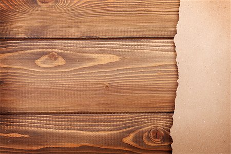 Cardboard paper over wooden background. Top view with copy space Stock Photo - Budget Royalty-Free & Subscription, Code: 400-08071546