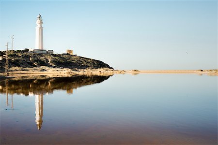 raulmellado (artist) - Trafalgar lighthouse and its reflection in water Foto de stock - Royalty-Free Super Valor e Assinatura, Número: 400-08071602