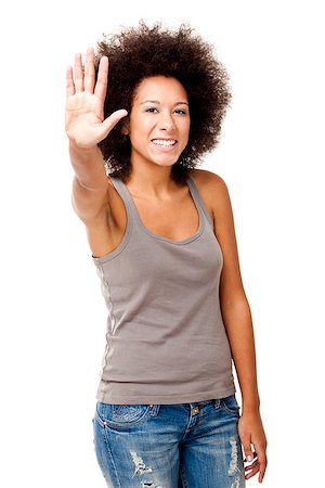 Happy Afro-American young woman isolated on white showing the palm of the hand Stock Photo - Budget Royalty-Free & Subscription, Code: 400-08071639