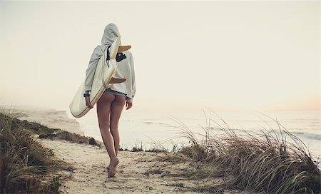 simsearch:400-08071725,k - Beautiful female Surfer looking for the waves Stock Photo - Budget Royalty-Free & Subscription, Code: 400-08071730