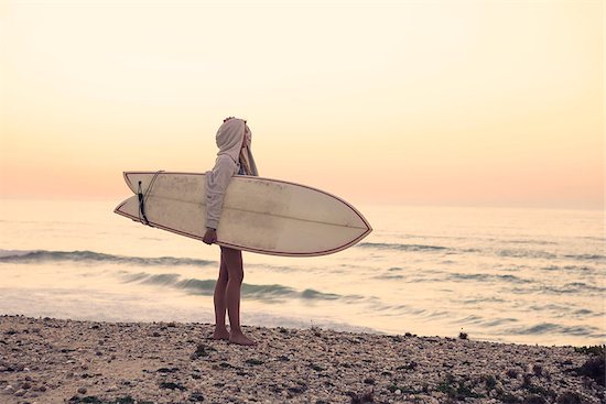 Beautiful female Surfer looking for the waves Stock Photo - Royalty-Free, Artist: iko, Image code: 400-08071732