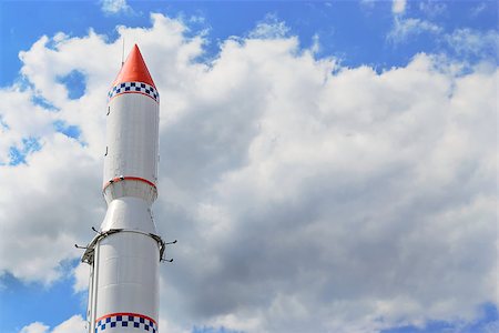 rocket launching - Upper part of a space rocket on a background cloudy sky Stock Photo - Budget Royalty-Free & Subscription, Code: 400-08071752