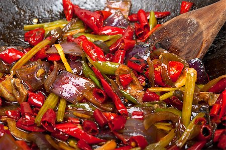 fried chili pepper and vegetable on a iron wok pan Stock Photo - Budget Royalty-Free & Subscription, Code: 400-08072101