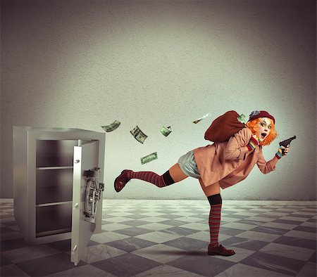débloqué - Clown steals from the safe and escapes Photographie de stock - Aubaine LD & Abonnement, Code: 400-08072687