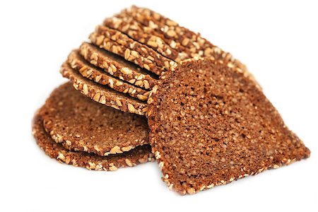 Slices of wholewheat bread isolated on white background Fotografie stock - Microstock e Abbonamento, Codice: 400-08072697