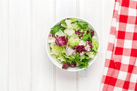 Fresh healthy salad over white wooden table. View from above with copy space Stock Photo - Budget Royalty-Free & Subscription, Code: 400-08072775