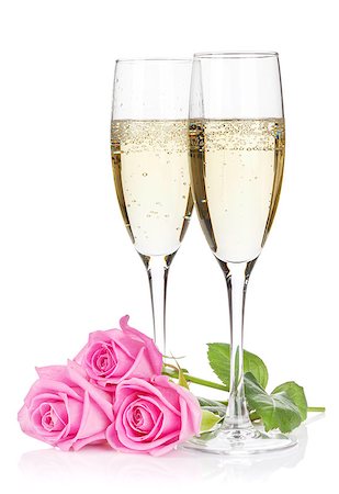 simsearch:400-07795205,k - Two champagne glasses and pink rose flowers. Isolated on white background Foto de stock - Super Valor sin royalties y Suscripción, Código: 400-08072813