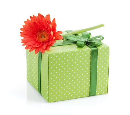 simsearch:400-07662543,k - Orange gerbera flower over gift box. Isolated on white background Stock Photo - Budget Royalty-Free & Subscription, Code: 400-08072946