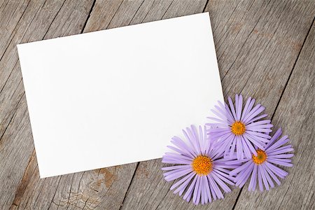 simsearch:400-07662543,k - Photo frame and gerbera flowers over wooden table background Stock Photo - Budget Royalty-Free & Subscription, Code: 400-08072949