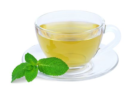 full breakfast - A cup of green tea with mint sprig isolated on a white background. Photographie de stock - Aubaine LD & Abonnement, Code: 400-08073045