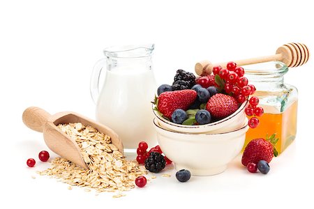 porridge and berries - Oatmeal  and fresh fruits isolated on white background. Stock Photo - Budget Royalty-Free & Subscription, Code: 400-08073115