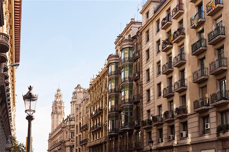 photojope (artist) - Via Laietana, a major thoroughfare in Barcelona, Catalonia, Spain in the Ciutat Vella district. Differents architectural styles buildings and the post building at background. Photographie de stock - Aubaine LD & Abonnement, Code: 400-08073138