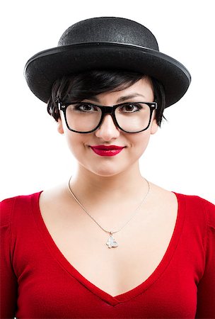 funny looking girls with glasses - Beautiful girl wearing a hat and nerd glasses, isolated over white background Stock Photo - Budget Royalty-Free & Subscription, Code: 400-08073593