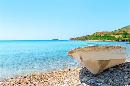Old rowboat on shore blue sea Stock Photo - Budget Royalty-Free & Subscription, Code: 400-08073741