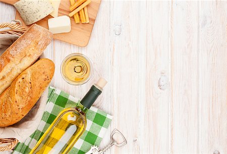 simsearch:400-07481826,k - White wine, cheese and bread on white wooden table background. Top view with copy space Stock Photo - Budget Royalty-Free & Subscription, Code: 400-08073887