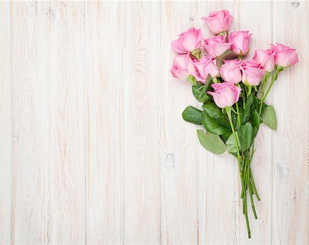 simsearch:400-08110734,k - Pink roses bouquet over wooden table. Top view with copy space Stock Photo - Budget Royalty-Free & Subscription, Code: 400-08073896