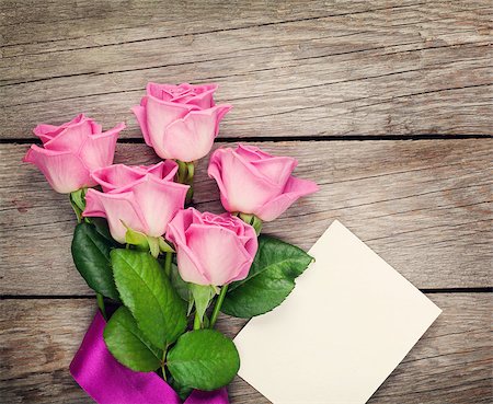 simsearch:400-08110734,k - Pink roses and valentines day blank greeting card or photo frame over wooden table. Top view with copy space Stock Photo - Budget Royalty-Free & Subscription, Code: 400-08073898