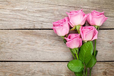 simsearch:400-08110734,k - Garden pink roses bouquet over wooden table. Top view with copy space Stock Photo - Budget Royalty-Free & Subscription, Code: 400-08073899