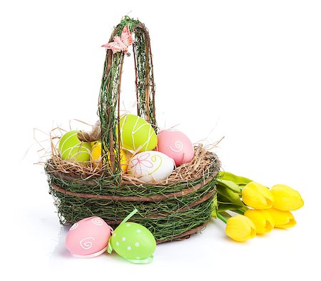 simsearch:400-07406705,k - Easter eggs basket and yellow tulips. Isolated on white background Foto de stock - Super Valor sin royalties y Suscripción, Código: 400-08073922