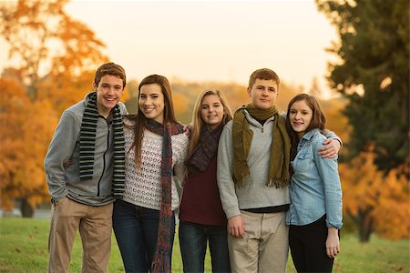 fall friends group - Cute group of teenaged males and females in scarves outdoors Stock Photo - Budget Royalty-Free & Subscription, Code: 400-08094160