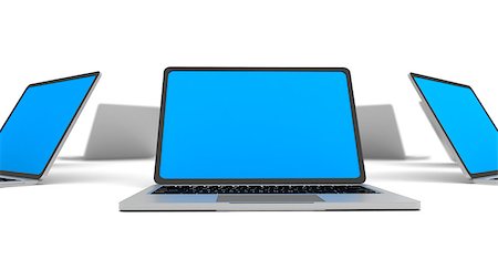 Laptops in a circle isolated on white. Shallow depth of field. Foto de stock - Royalty-Free Super Valor e Assinatura, Número: 400-08094391