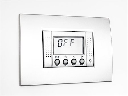 Digital thermostat isolated on white background, display Off message Stockbilder - Microstock & Abonnement, Bildnummer: 400-08095974